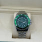Rolex submariner silver with green rotating dial with date