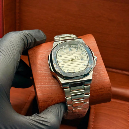 PP silver with white dial with date