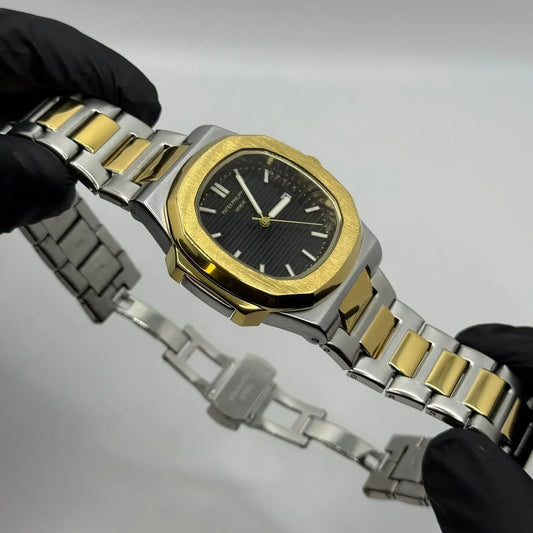 PP Gold with black dial with date